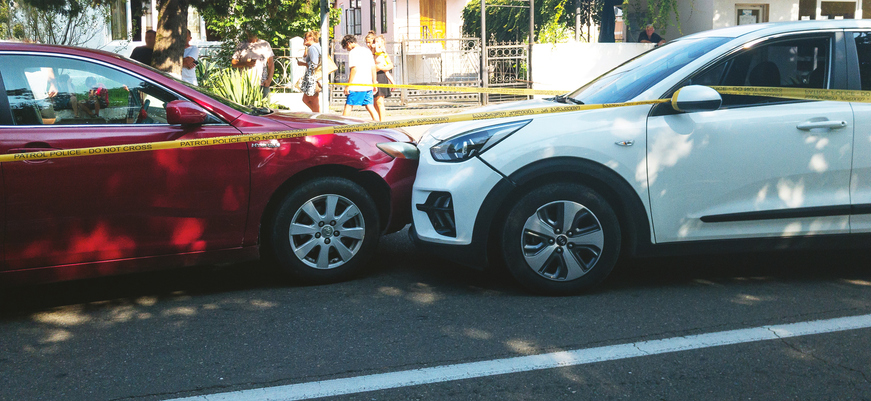 two cars met head-on, red is in the oncoming lane